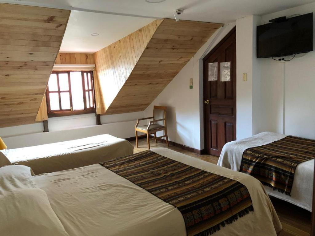キト Casa Del Arupoホステル エクステリア 写真