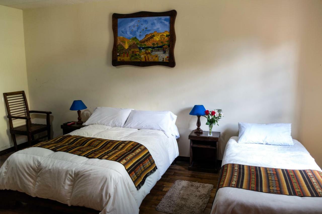 キト Casa Del Arupoホステル エクステリア 写真